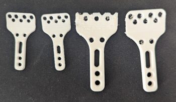 Four 3D-printed prototypes of the porous radial fracture fixation plate